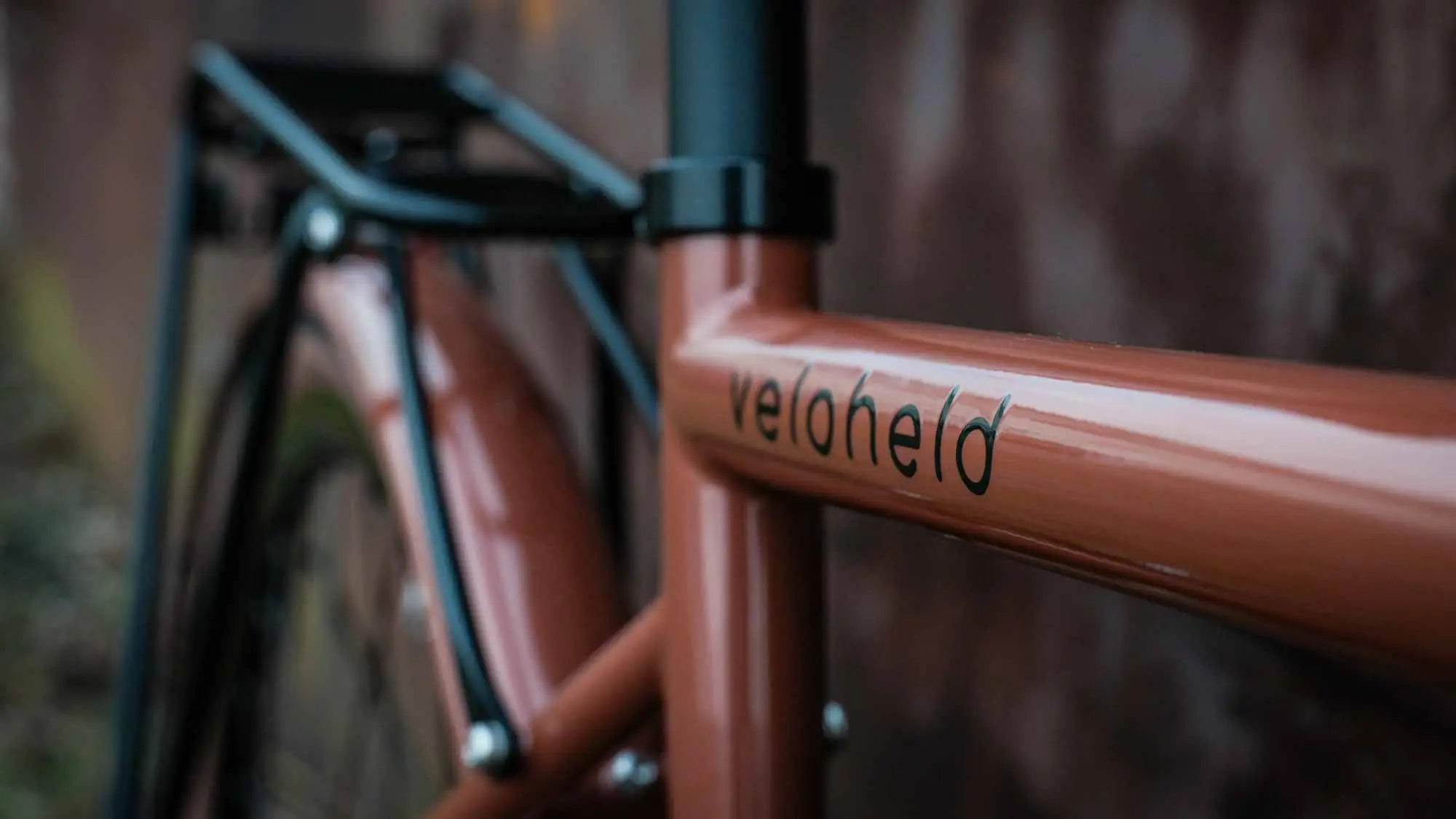veloheld.alleyX Tourist in perlkupfer Oberrohr mit veloheld-logo